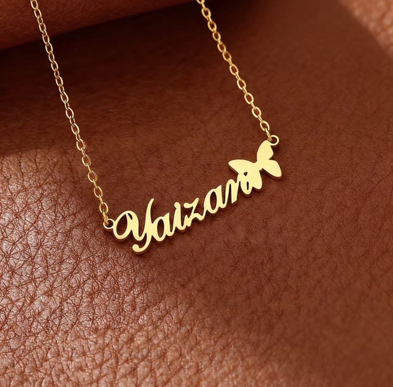 Gold personalized name necklace with butterfly charm