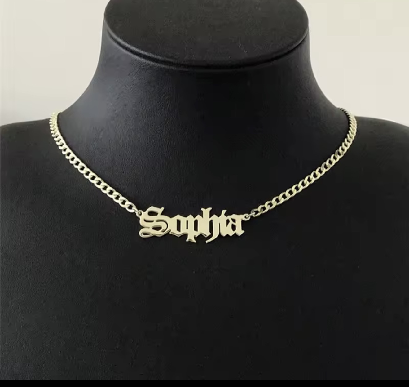 Custom name pendant on a Cuban-link chain