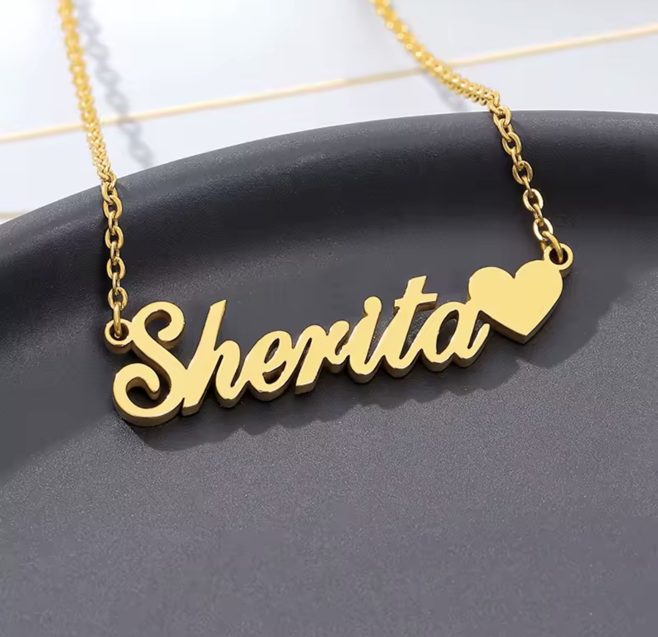 Personalized name necklace with a heart