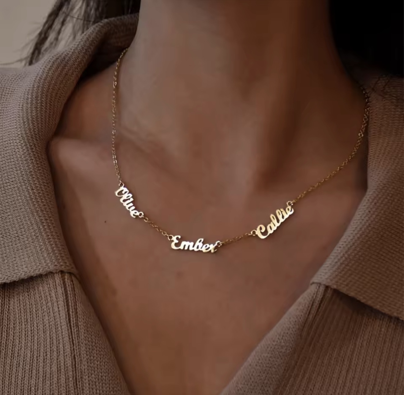 Gold necklace with three personalized name charms